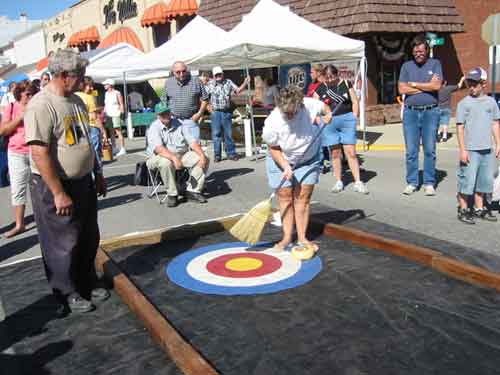Cheese Curling at the Amish Country Cheese Festival on Labor day Weekend